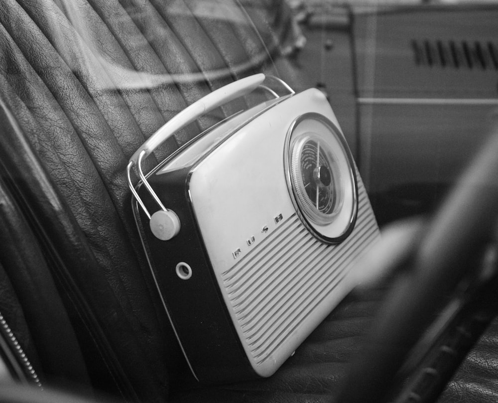 a radio sitting on the back of a car