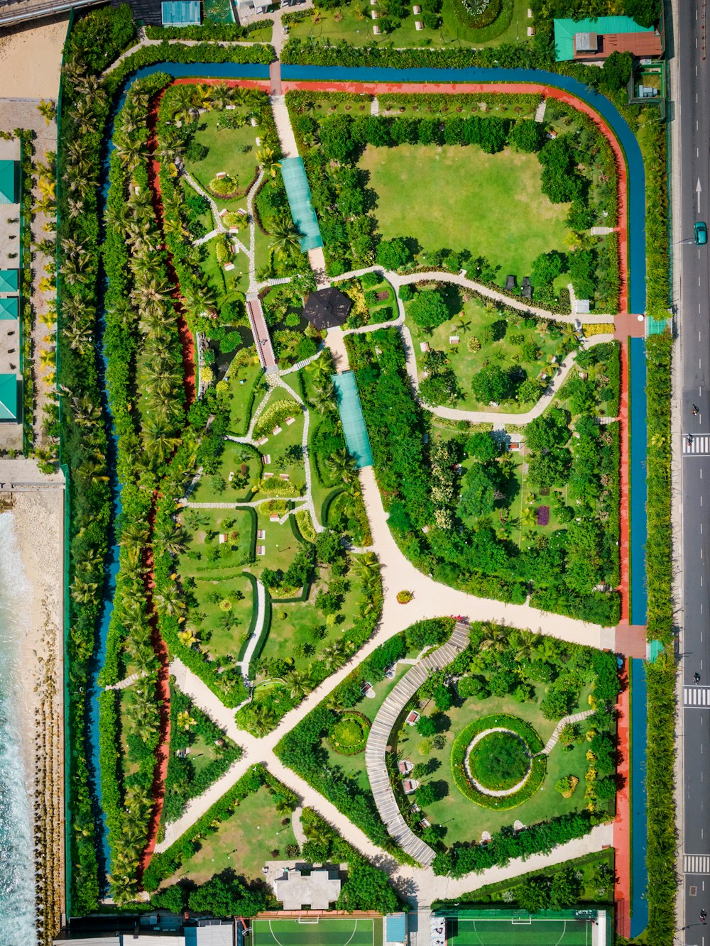 an aerial view of a park with lots of grass