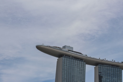 a very tall building with a sky background