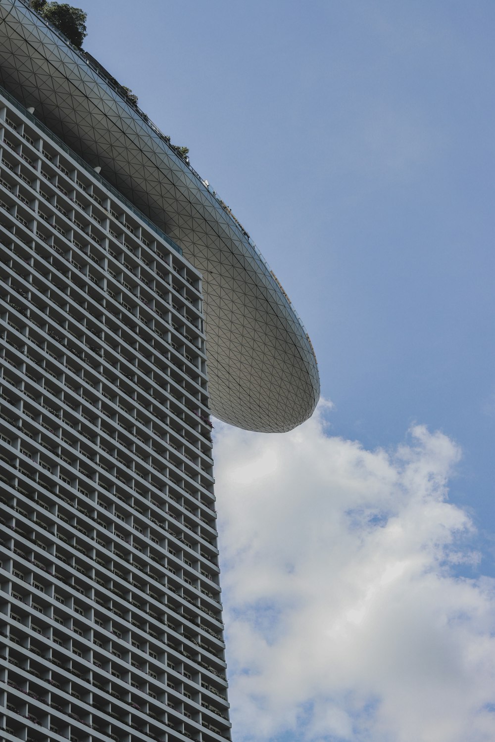 a very tall building with a sky in the background