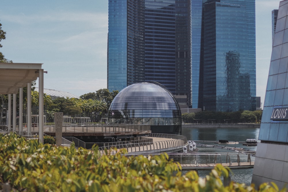 a view of some buildings and a body of water