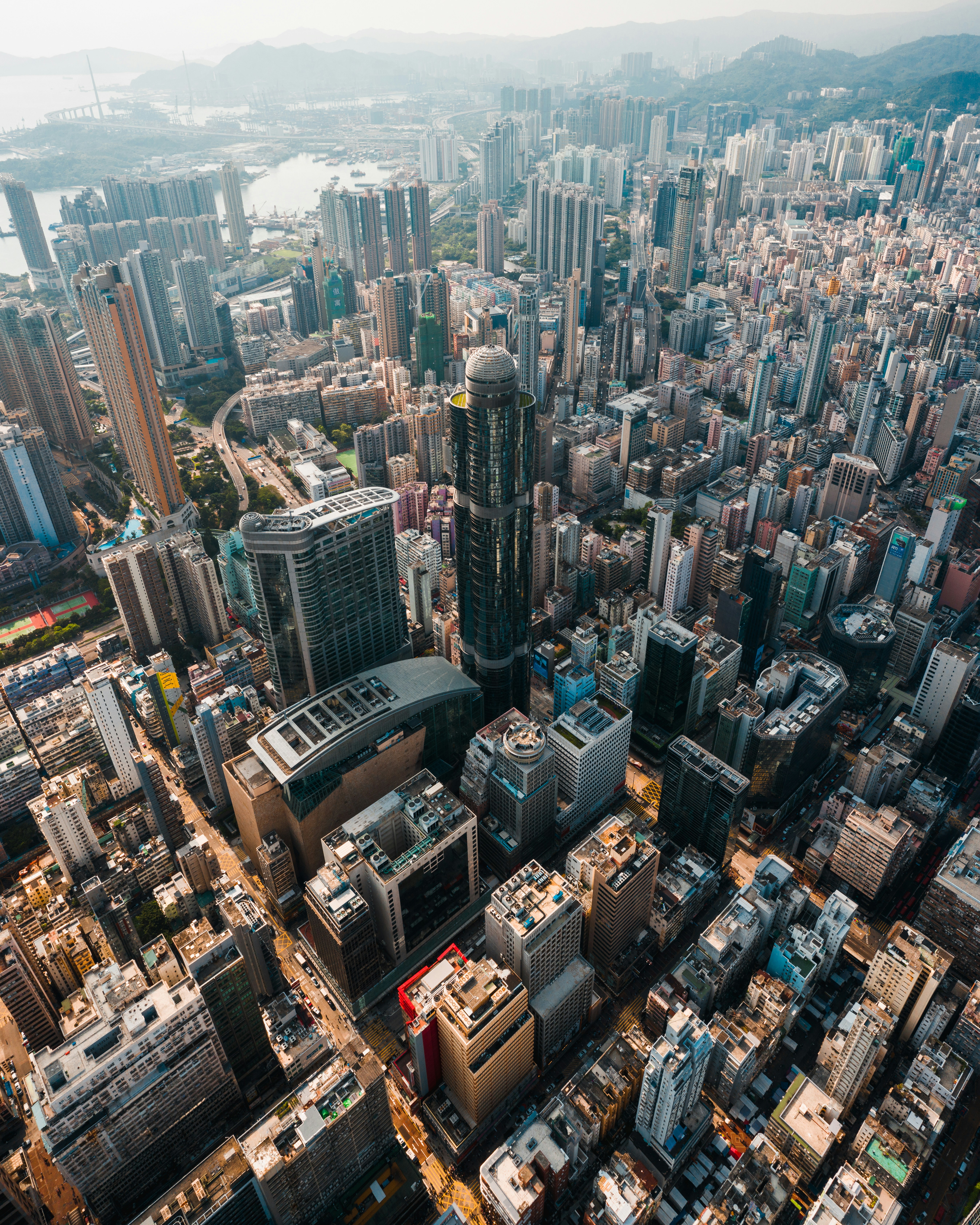 an aerial view of a city with tall buildings