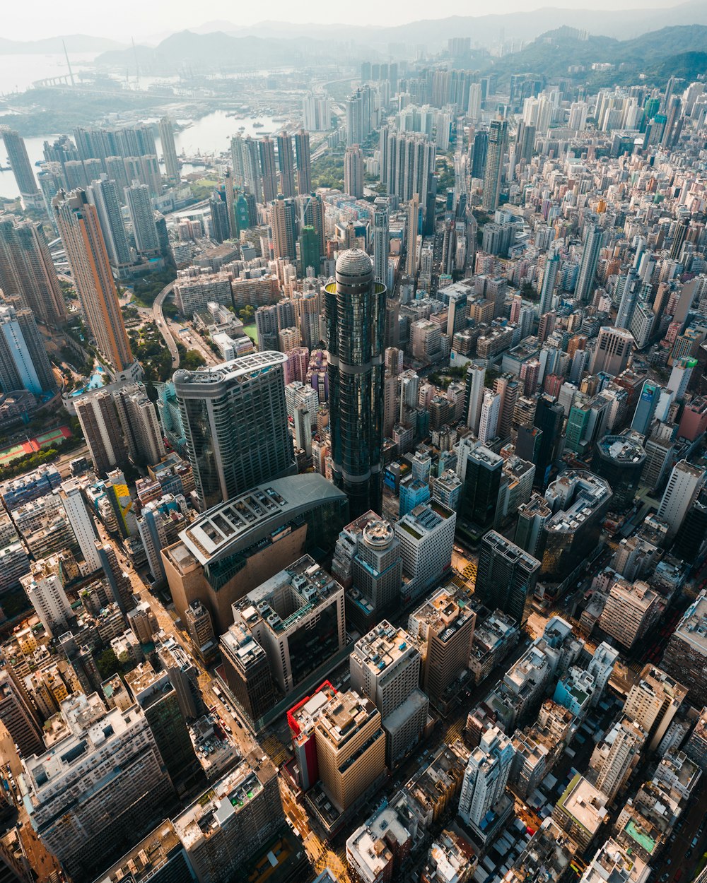 an aerial view of a city with tall buildings