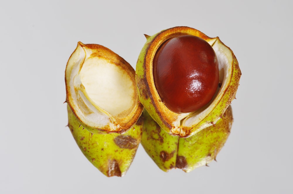 a close up of a fruit on a white background