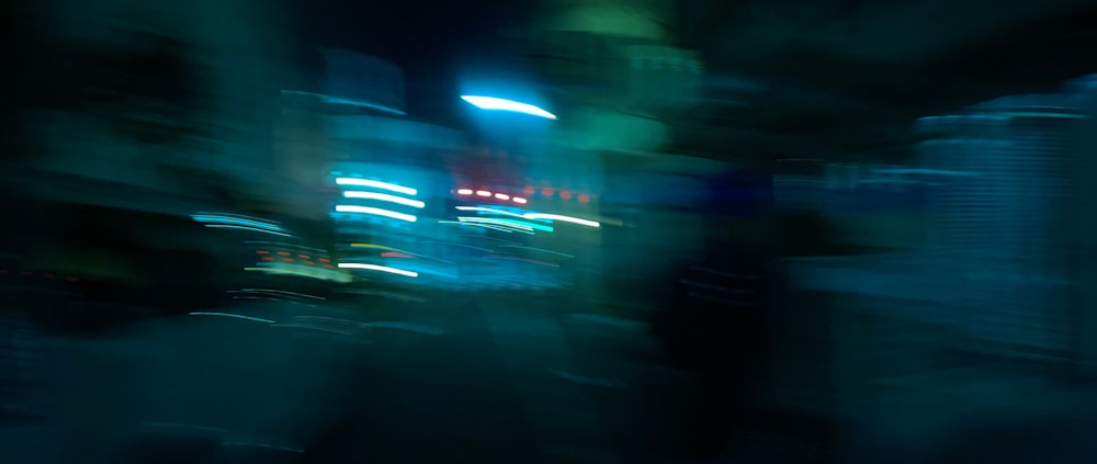 a blurry photo of a city at night