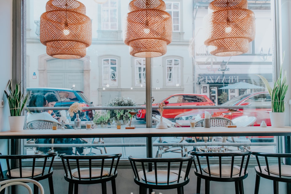 a restaurant with a lot of tables and chairs