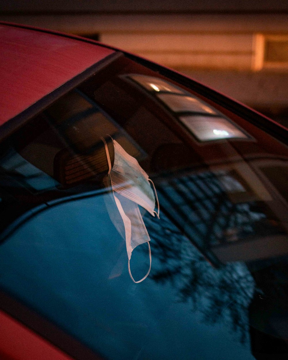 a close up of a car window with a sticker on it