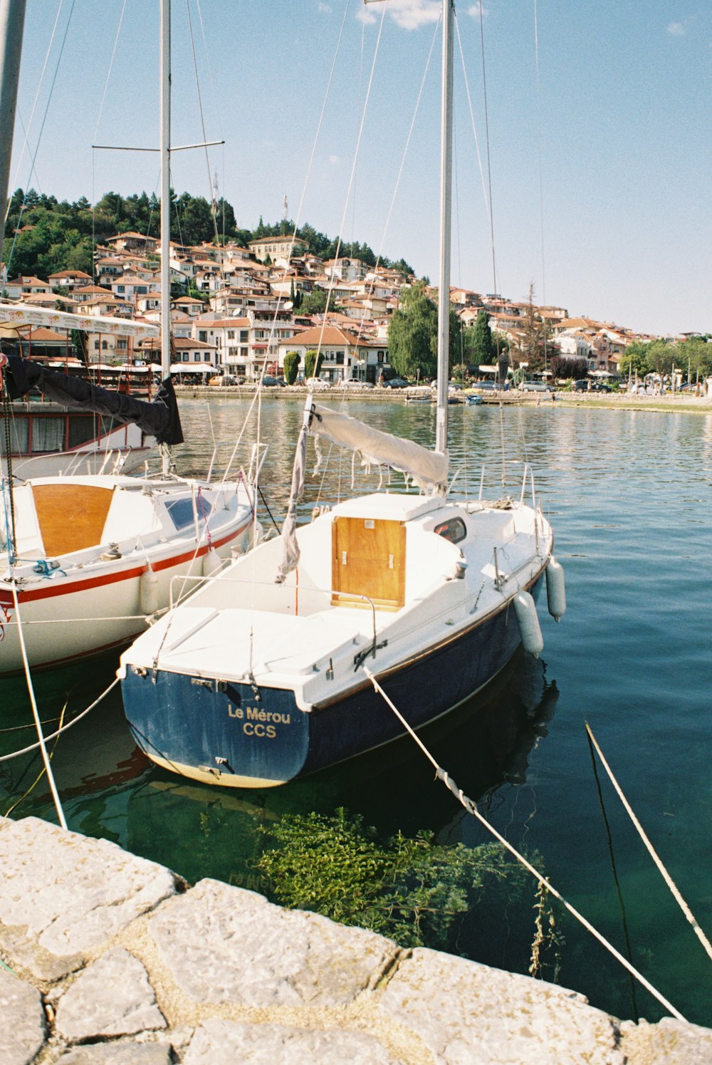 a couple of boats that are sitting in the water