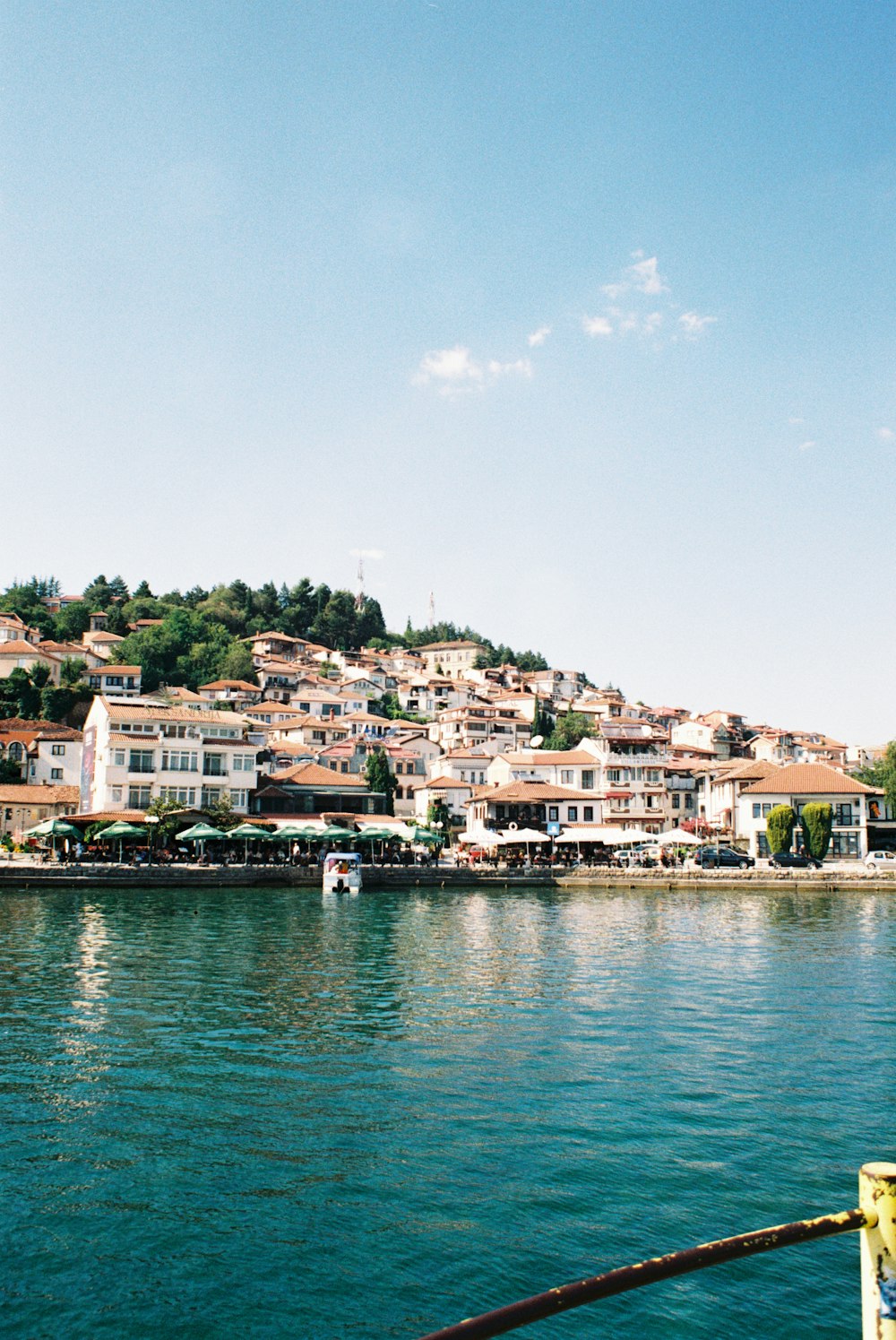 a view of a town from a boat on the water