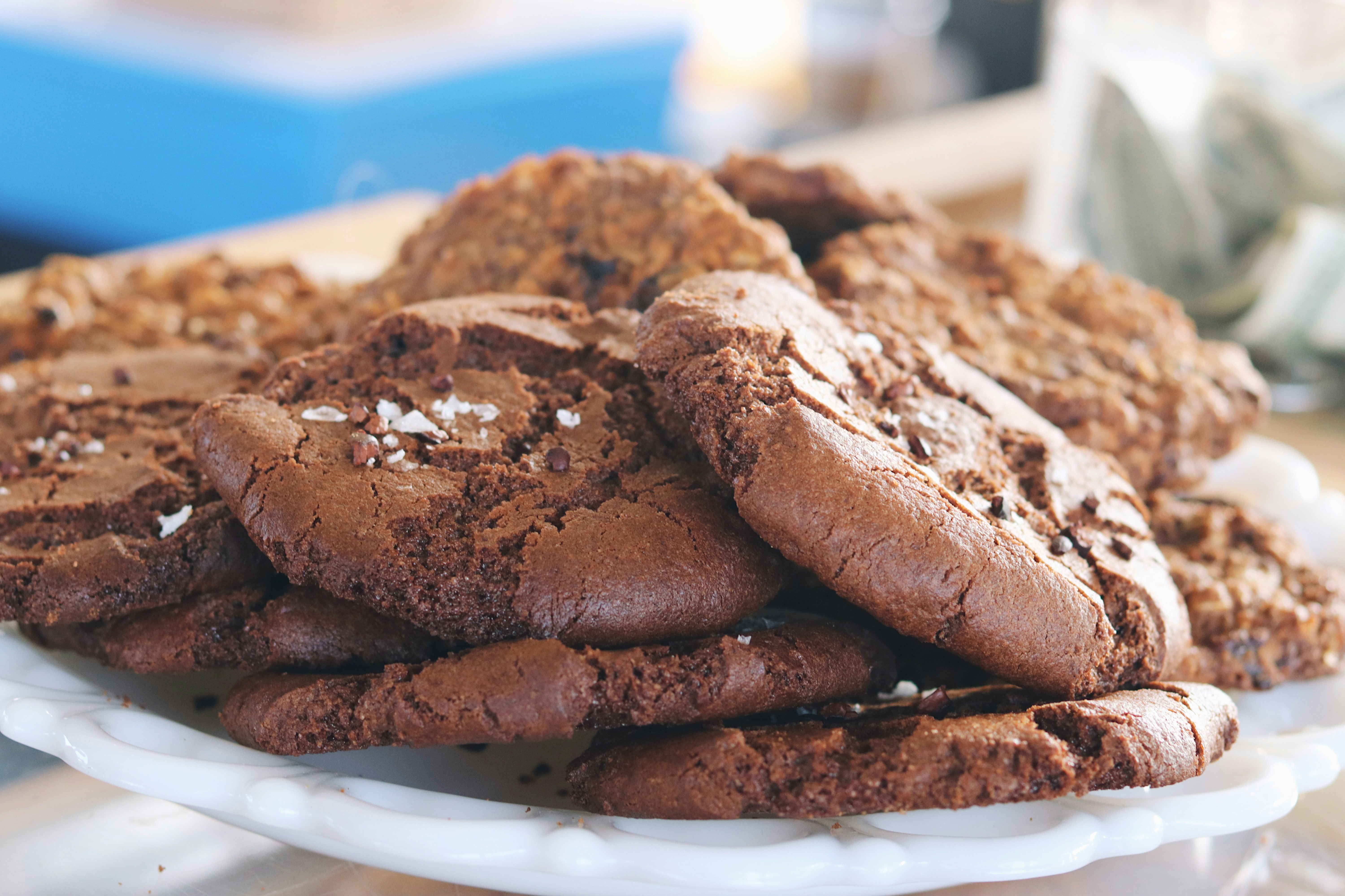 a plate full of chocolate cookies on a table