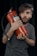 a man holding a red fire extinguisher