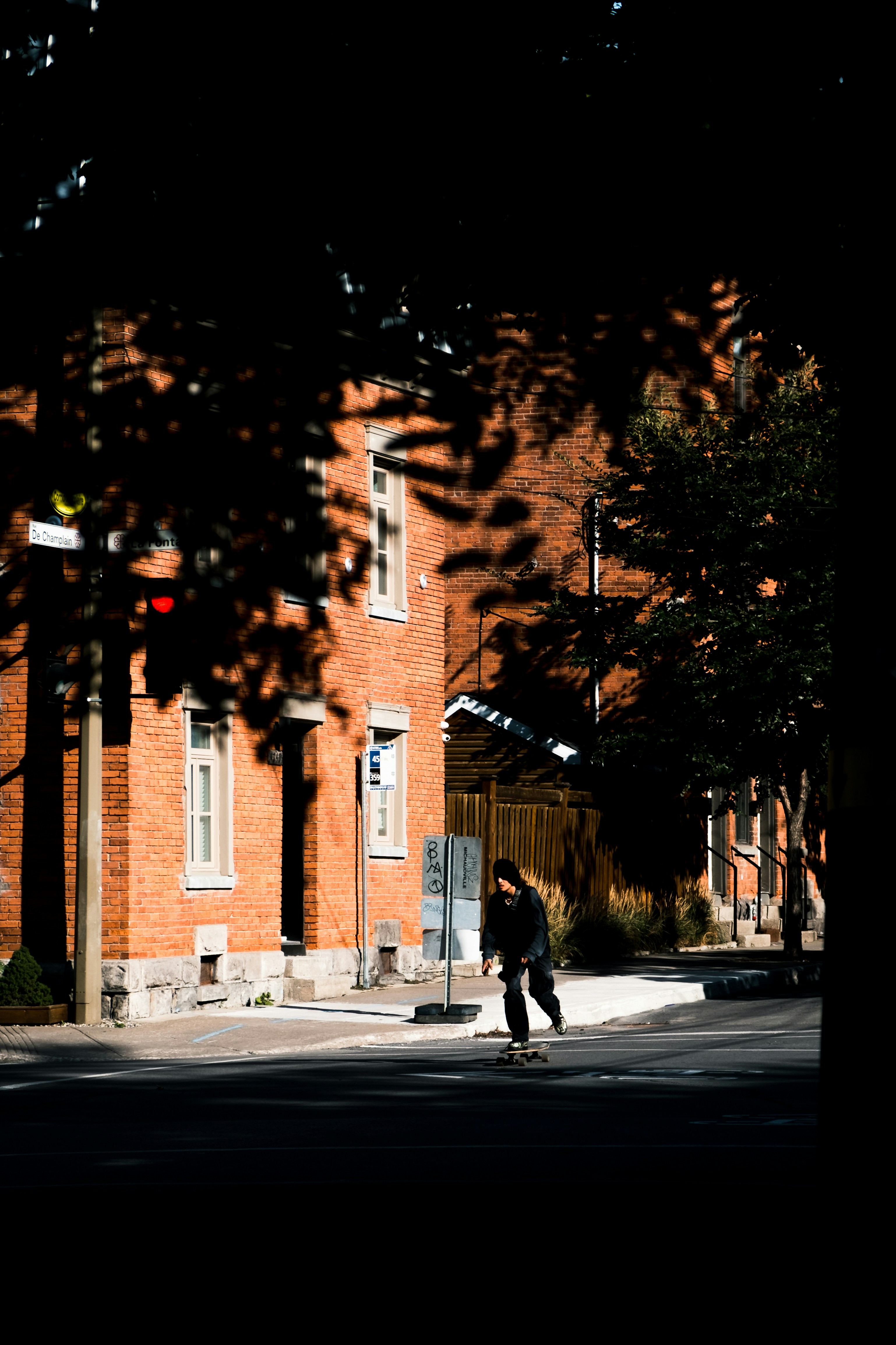 a person riding a skateboard on a city street