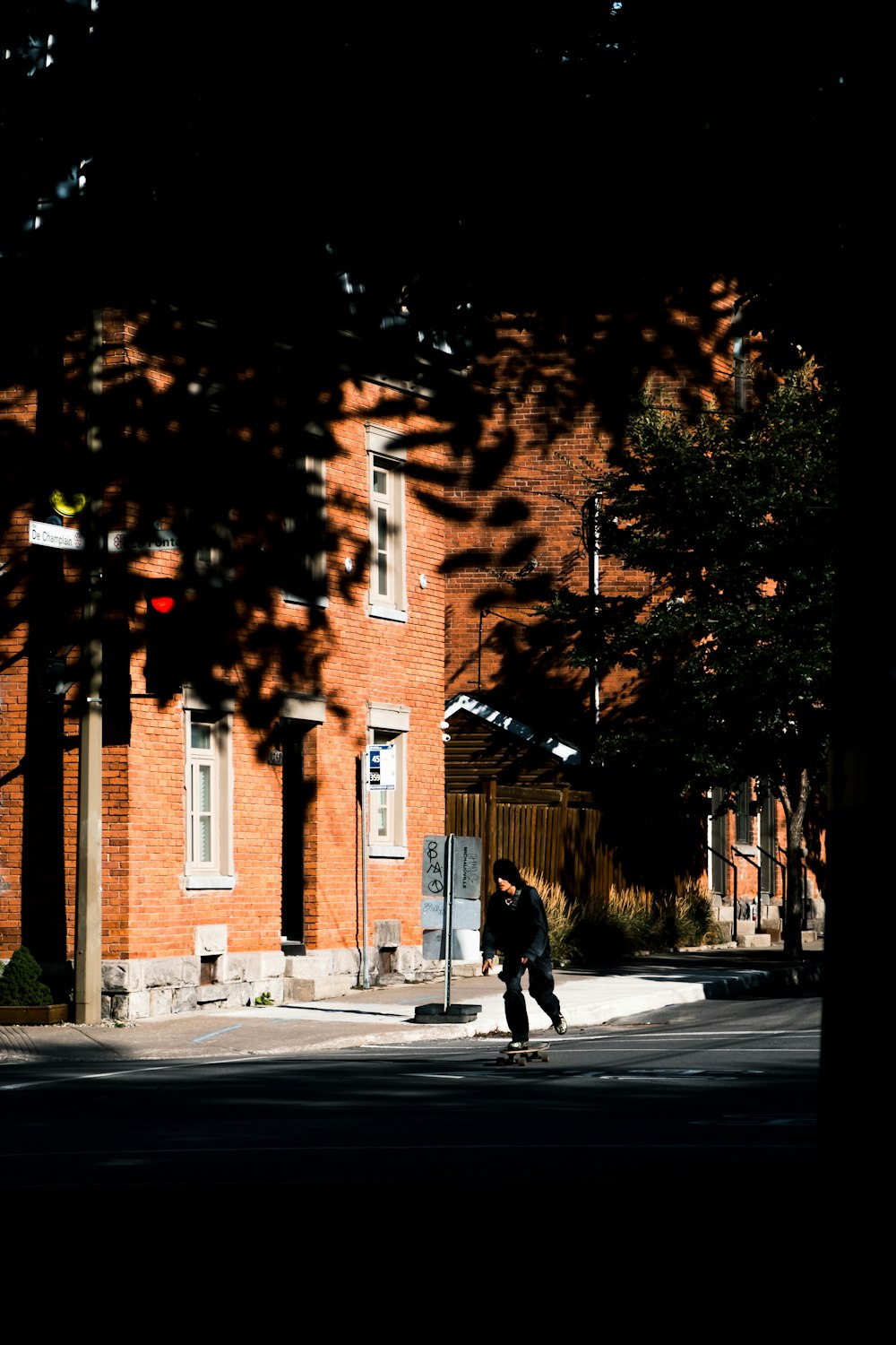 a person riding a skateboard on a city street