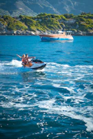 Water sports enthusiasts jet-skiing and snorkeling near Vuda Marina.