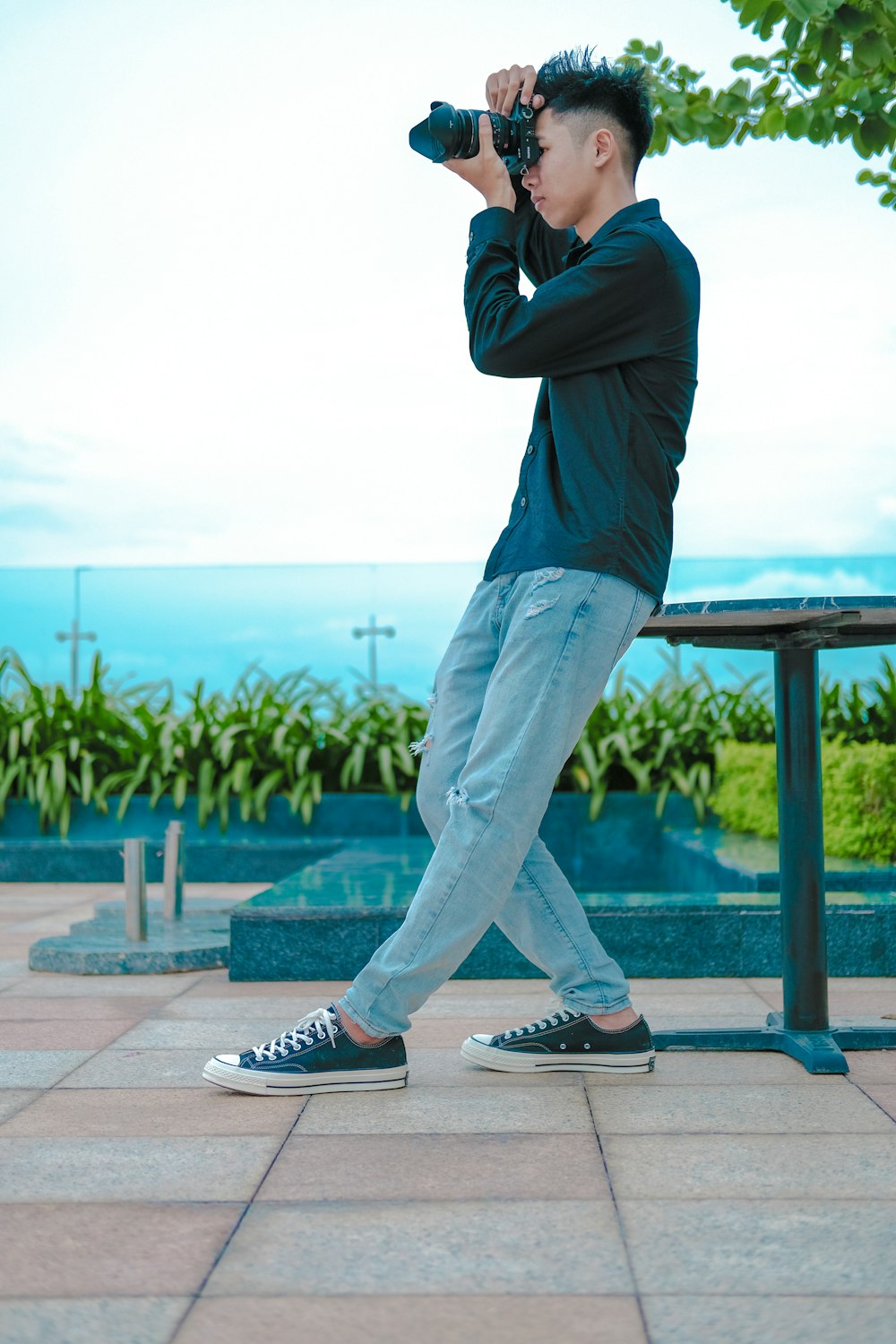 a man taking a picture of himself with a camera