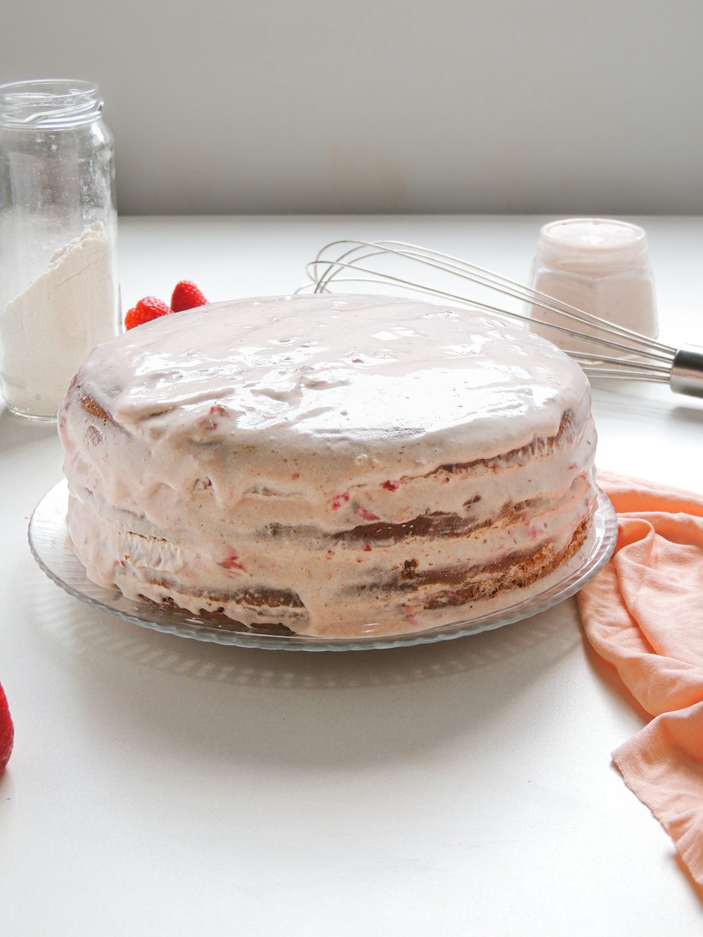 a cake sitting on top of a glass plate