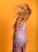 a woman with her hair blowing in the wind