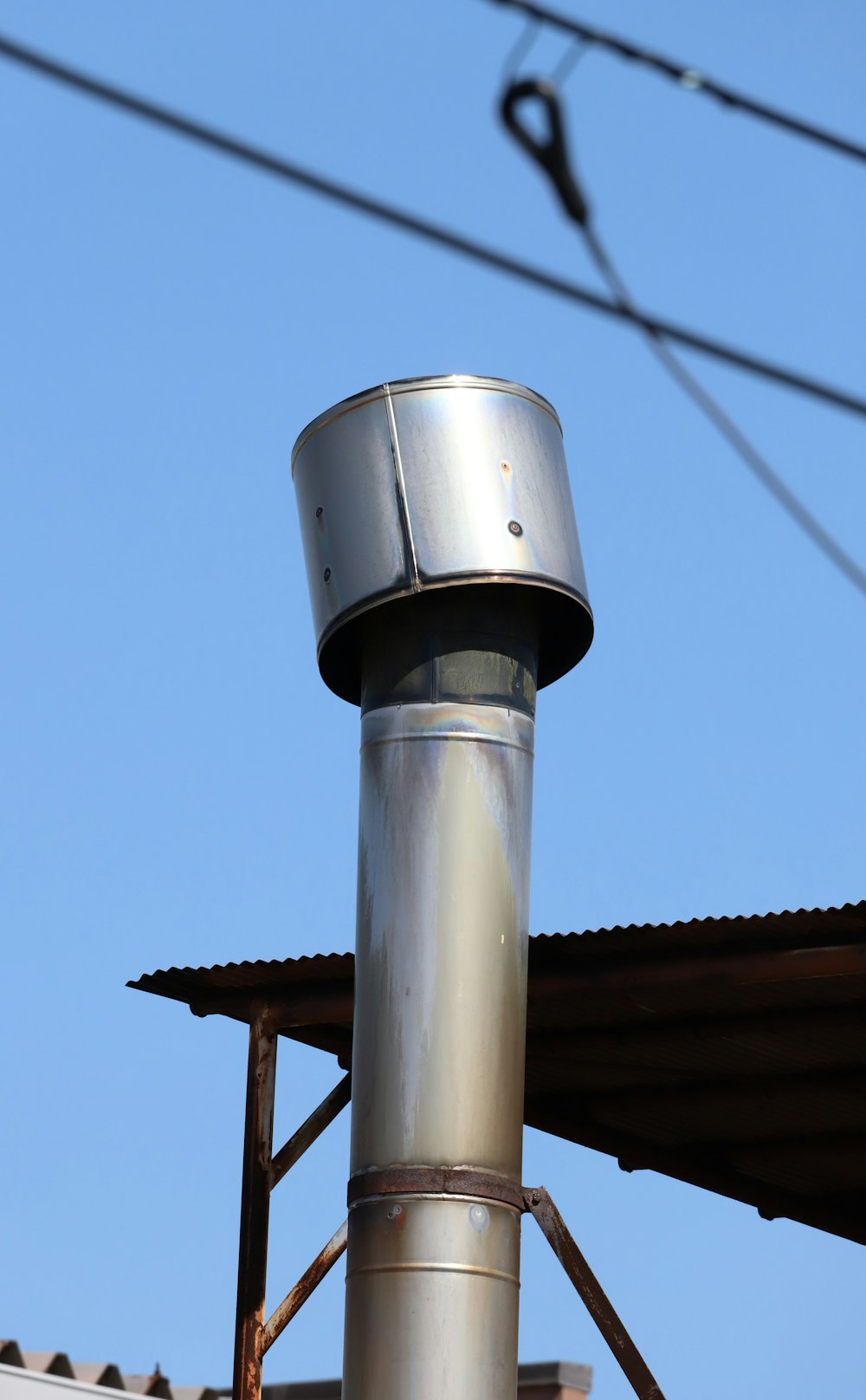a metal object on top of a metal pole