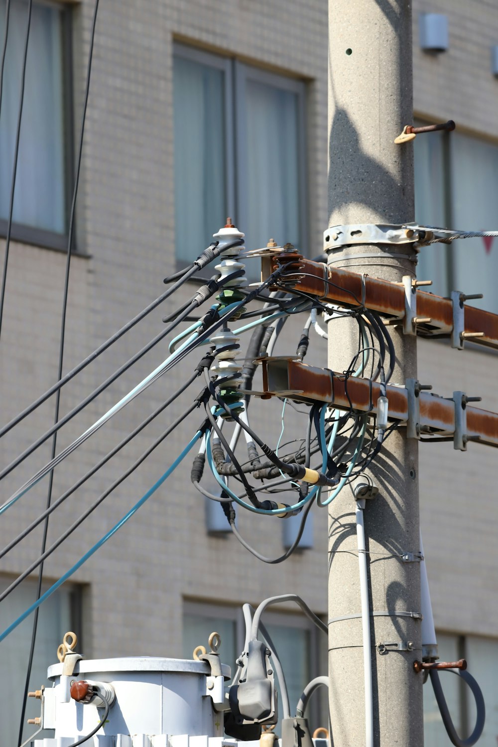 a pole with many wires attached to it