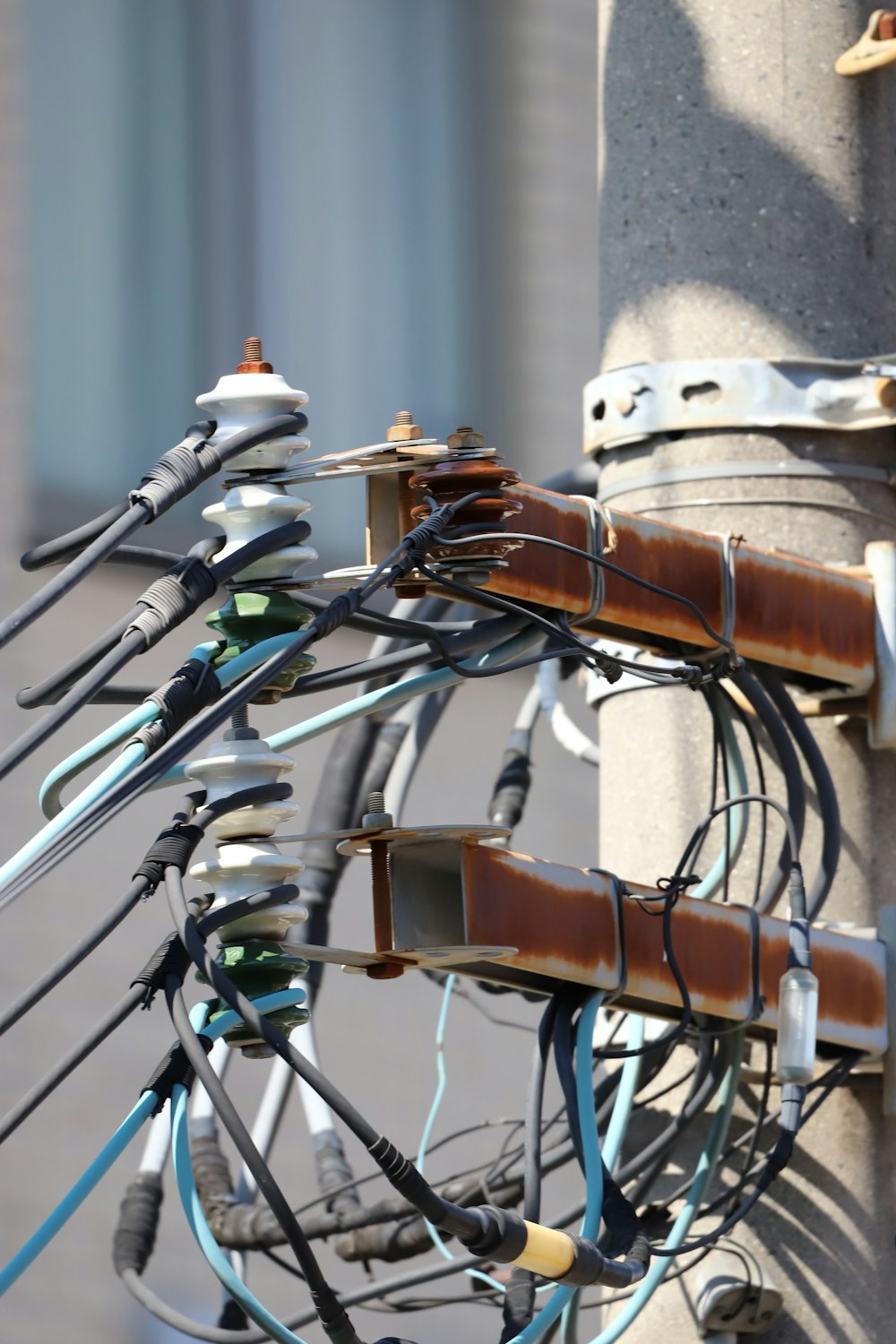 a bunch of wires that are attached to a pole