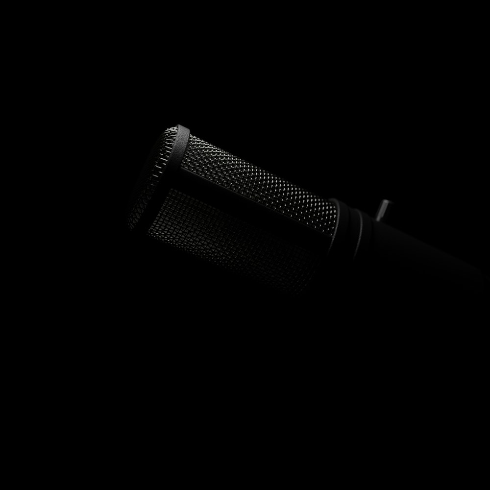 a close up of a microphone in the dark