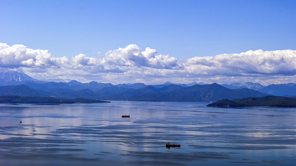 a large body of water surrounded by mountains