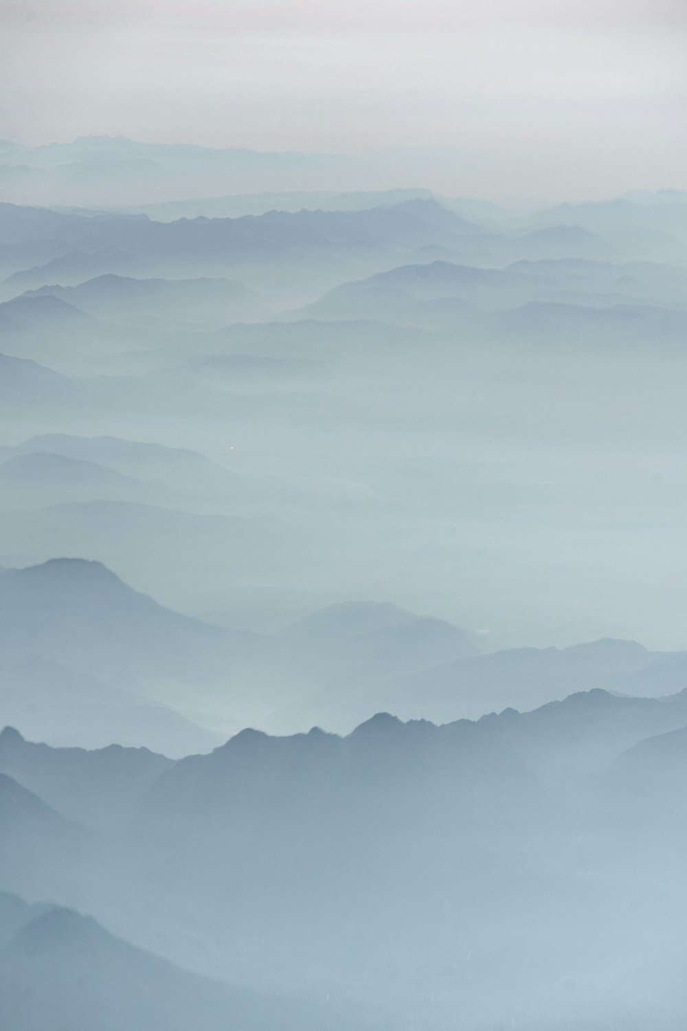 a view of a mountain range from an airplane