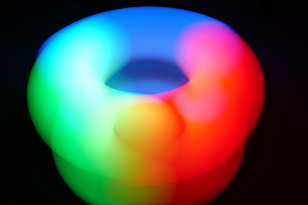 a colorful object with a black background
