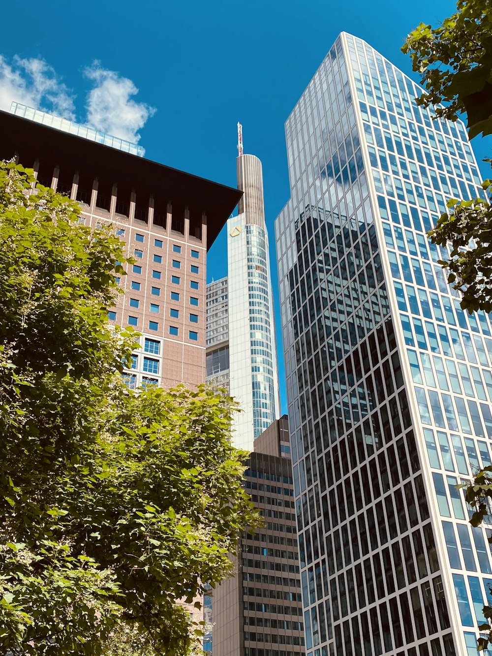 a group of tall buildings sitting next to each other