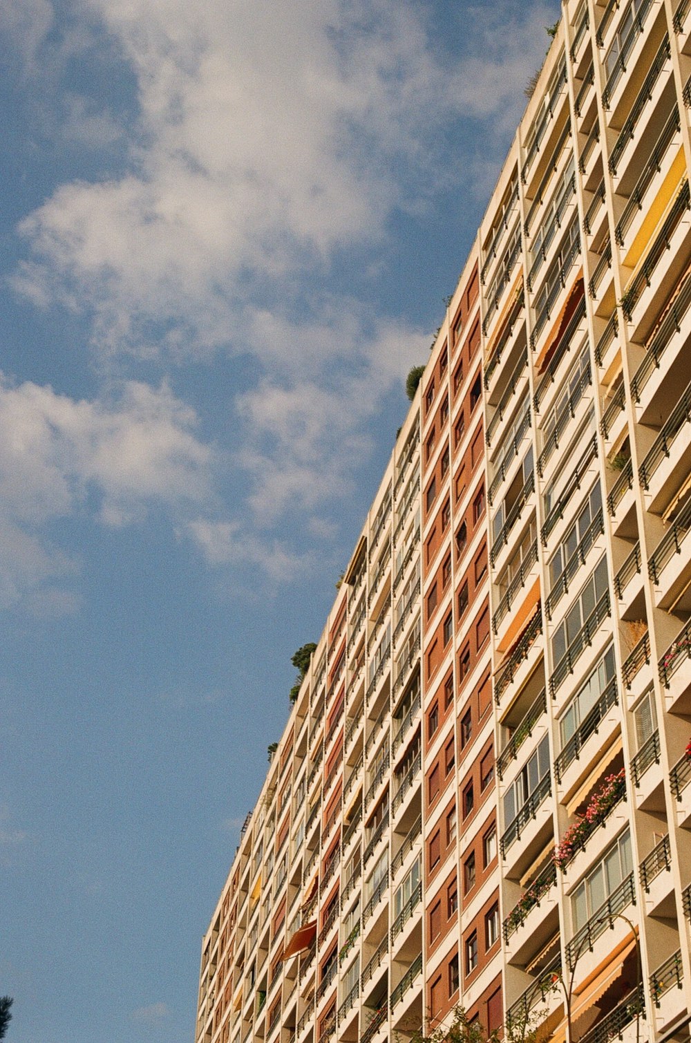 a tall building with balconies and balconies on it