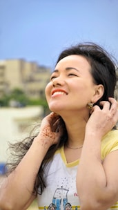 a woman with her hair in the wind