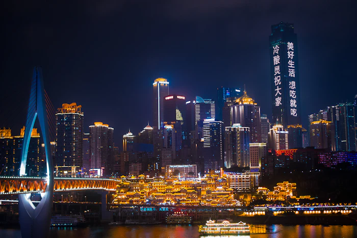 Chongqing skyline and river at night