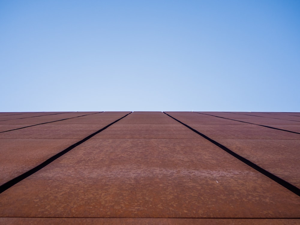 a very tall building with a sky in the background