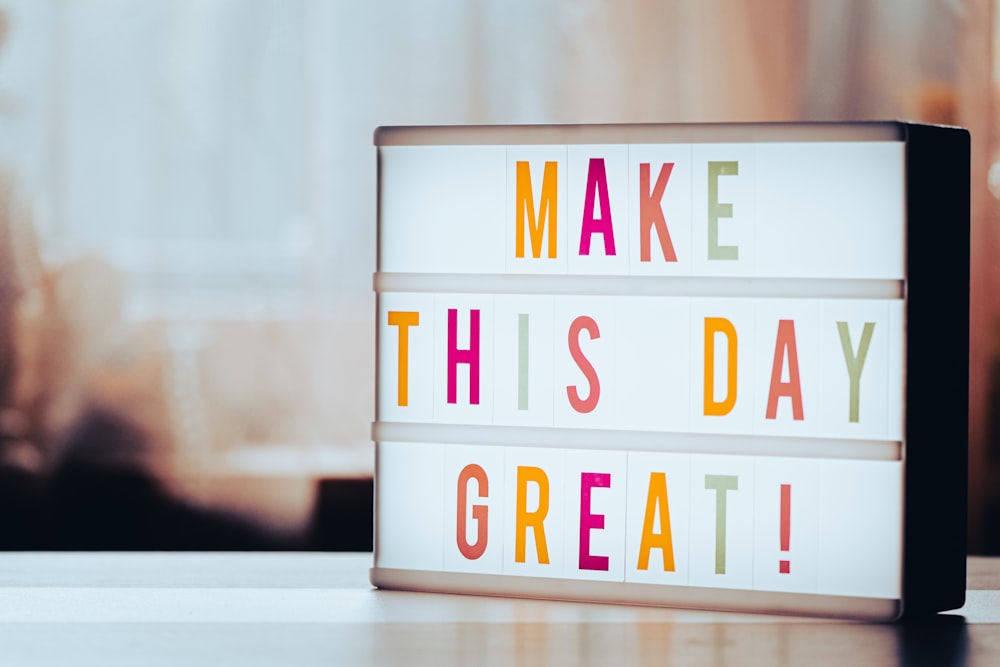 a light box that says make this day great