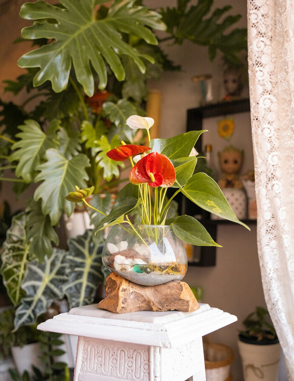 a vase filled with flowers sitting on top of a table