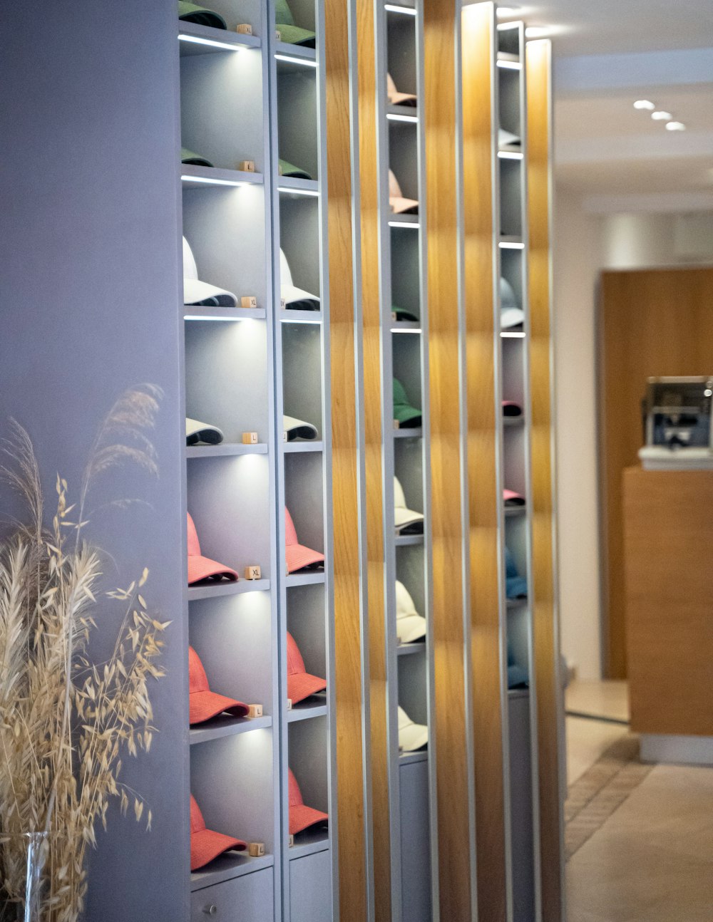 a room filled with lots of shelves filled with hats