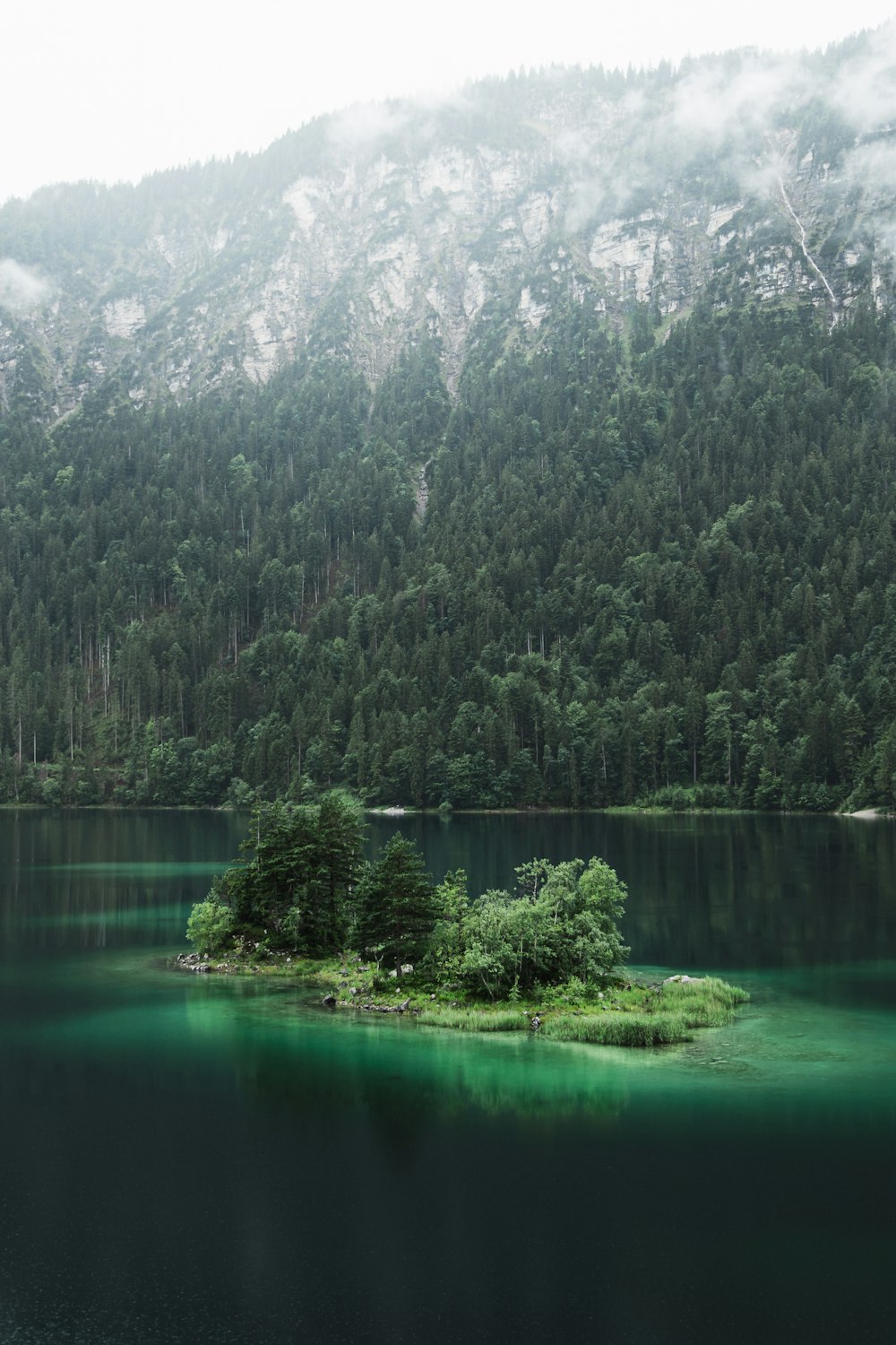 a small island in the middle of a lake