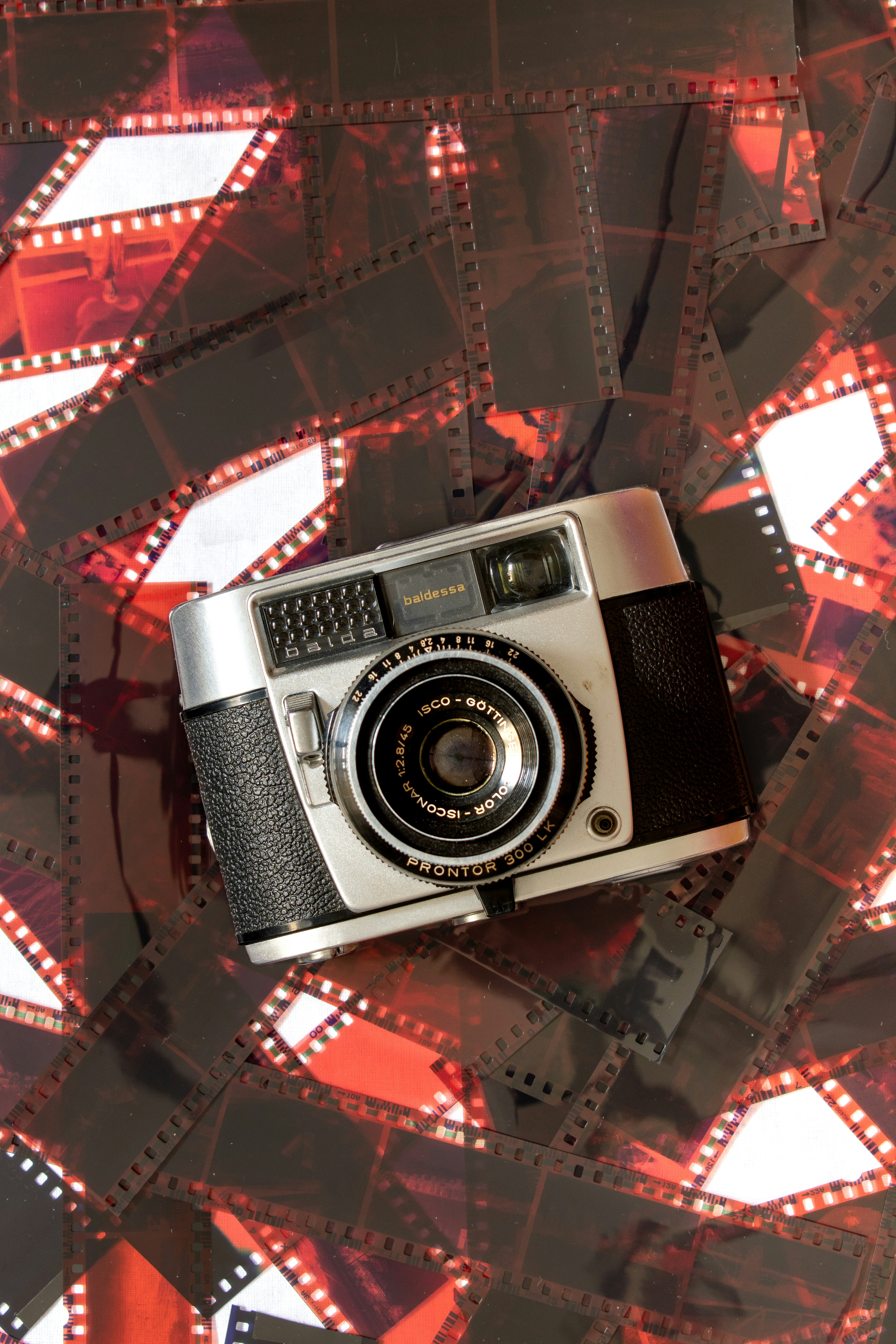 a camera sitting on top of a film strip