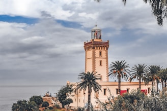The Literary Titans of Tangier a tall tower with a clock on top of it