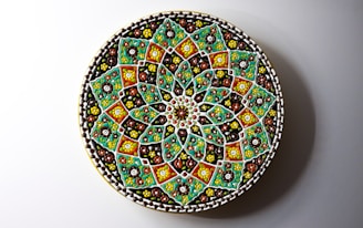 a decorative plate with a colorful design on it
