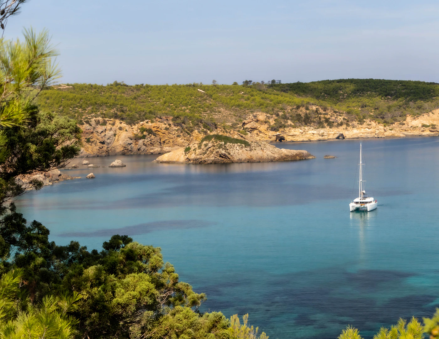 Anchored yacht in a quiet bay