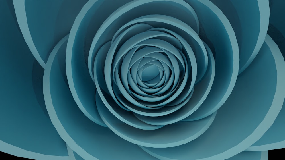 a close up of a blue flower on a black background