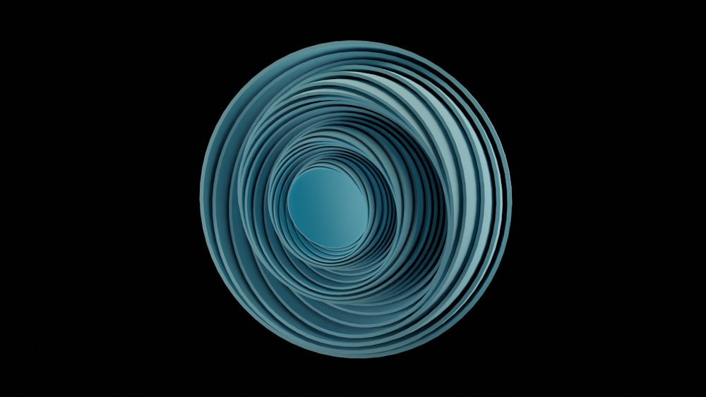 a blue circular object on a black background