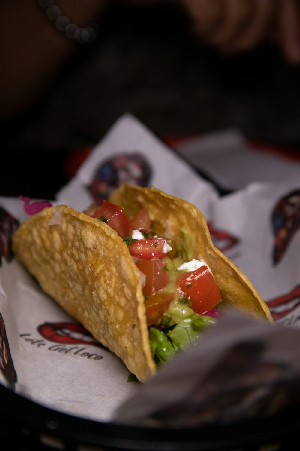 a close up of a taco on a plate