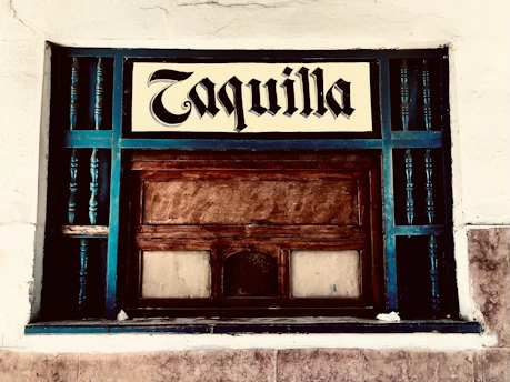 A modern ticketing interface displaying open and resolved tickets with priority labels in a professional Islamic theme.