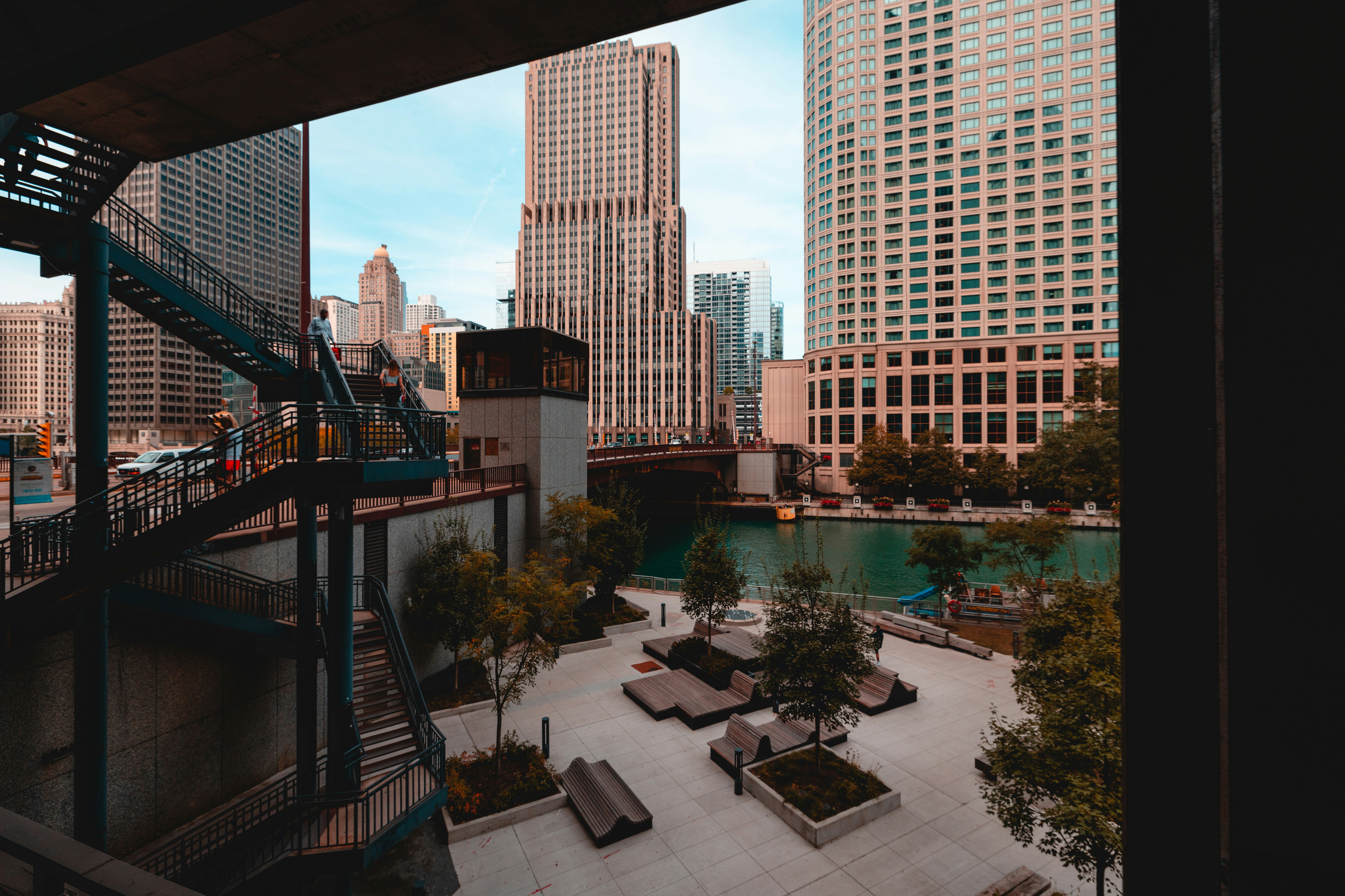 A luxury rooftop lounge in Chicago with skyline views and comfortable seating - modern loft apartments chicago