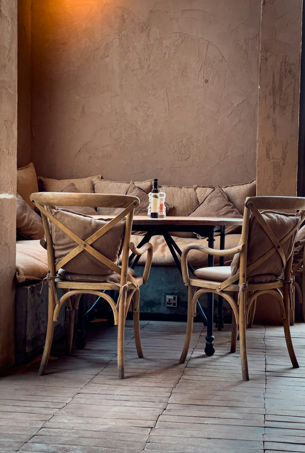 a couple of chairs sitting next to a table