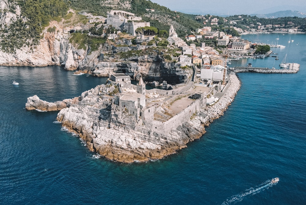 an aerial view of a small island in the middle of the ocean