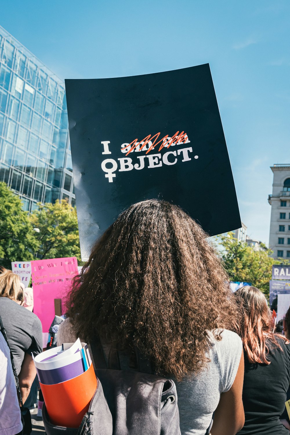 a woman with a sign on her head