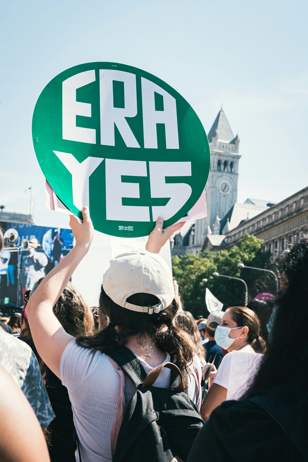 a group of people holding up a sign that says err yes
